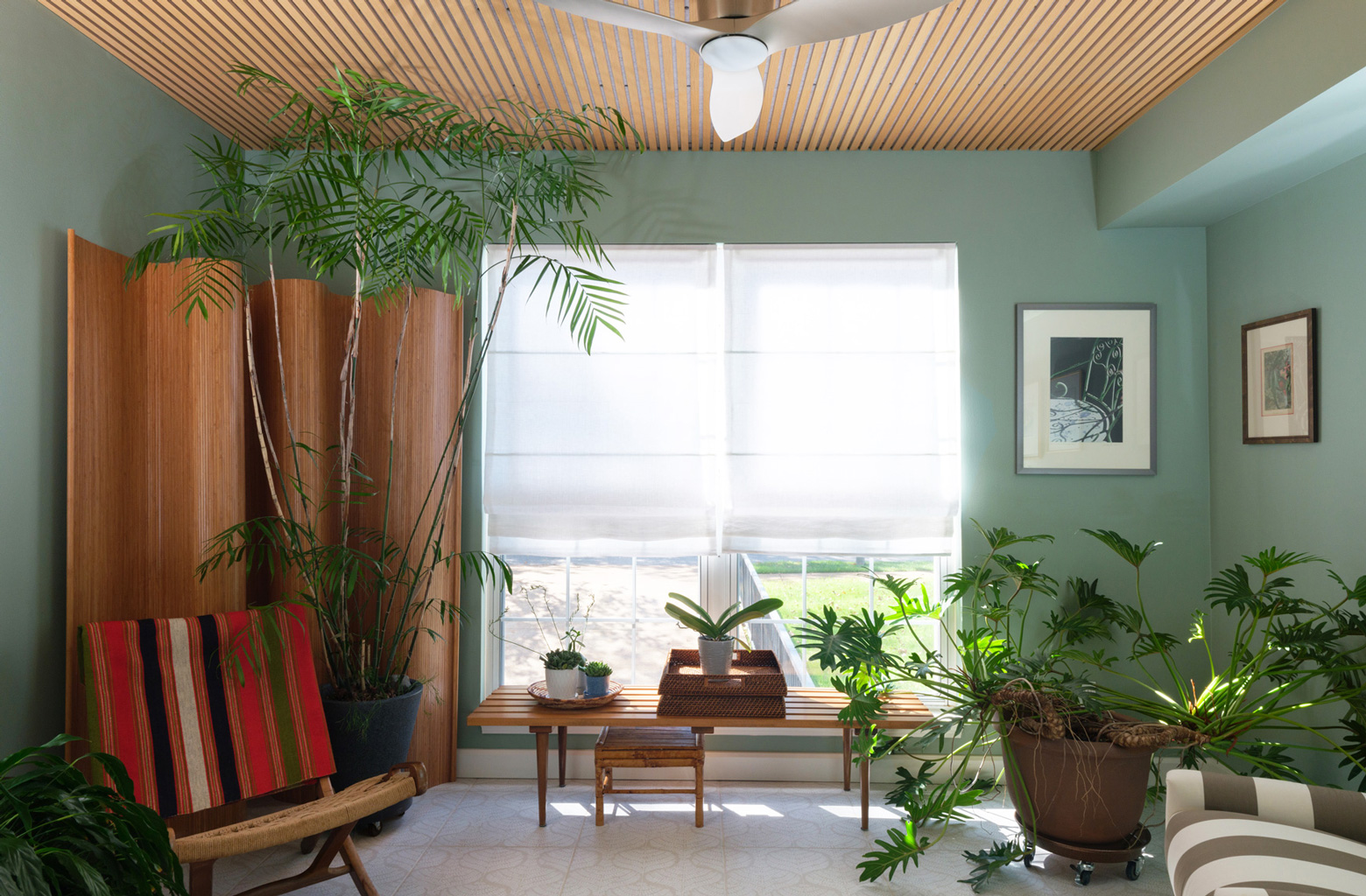 Kitchen with blue ceiling and patterned backsplash – U-shaped kitchen with custom cabinetry and blue paneled ceiling in a Central West End remodel by Hercules Design Build, a general contractor Hercules trusted for custom kitchen designs.